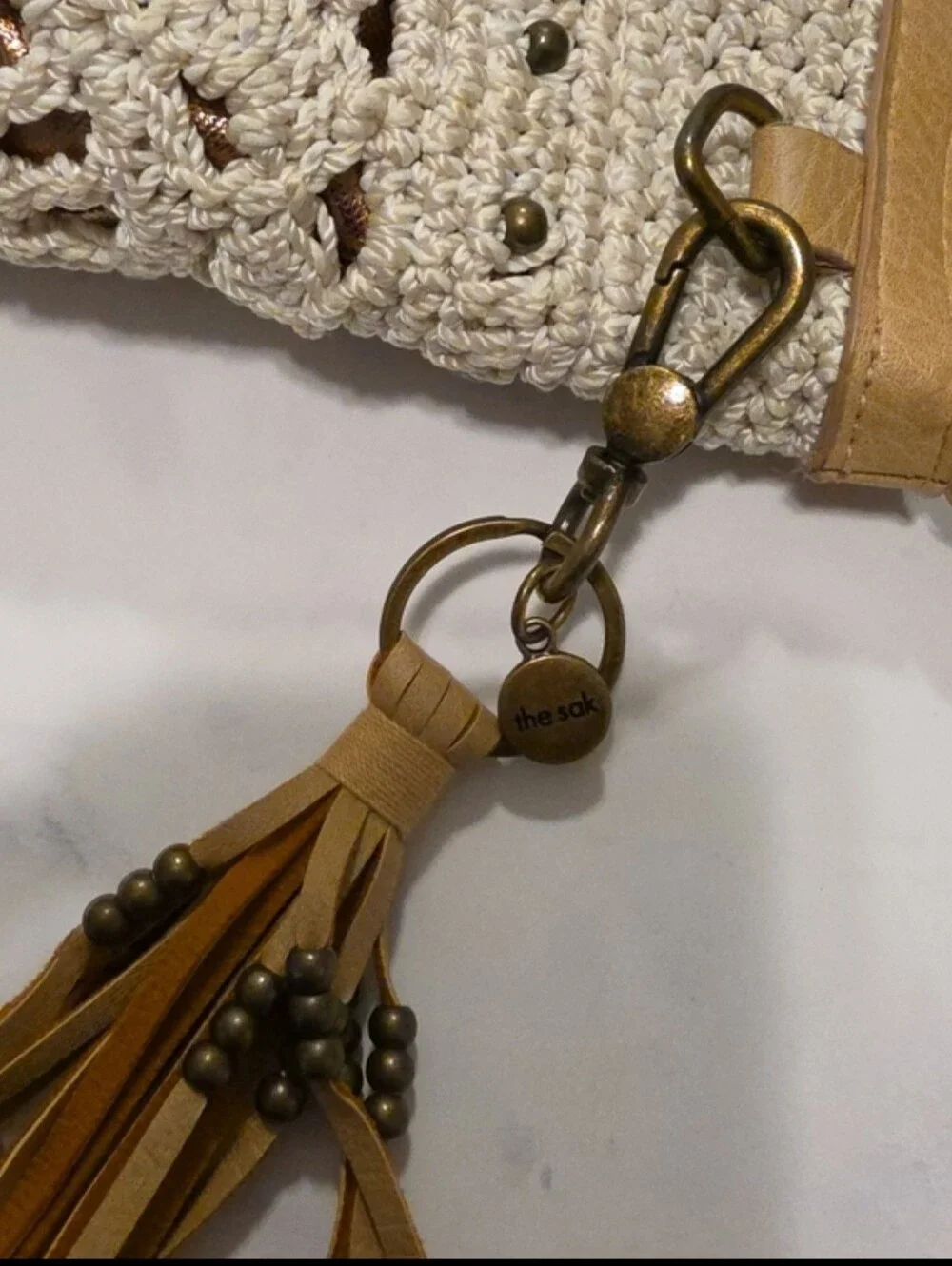 The Sak Crochet Pattern Crossbody Bag with Tan Trim